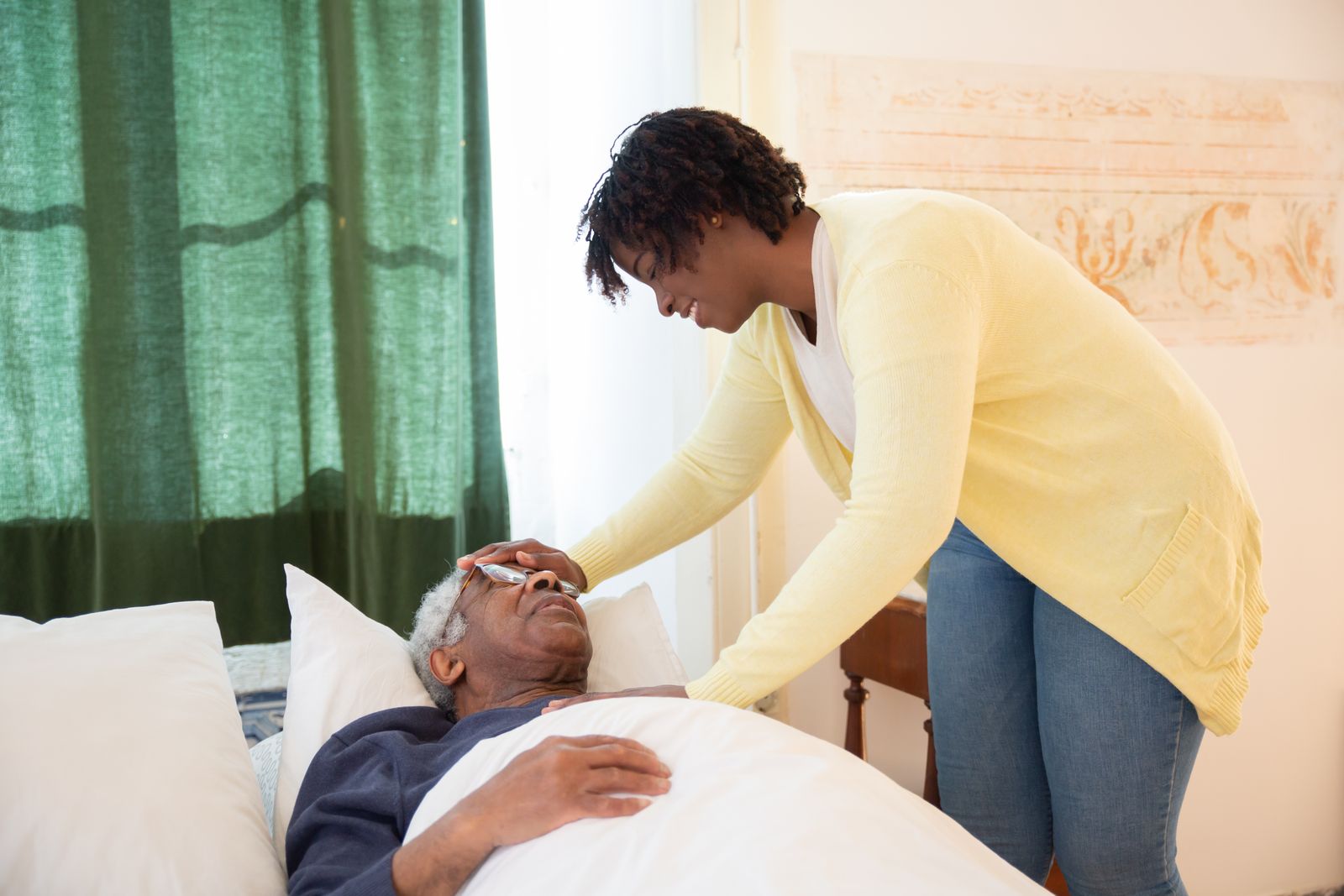 2149370415 Caregiver helping a senior stay independent at home in Henderson